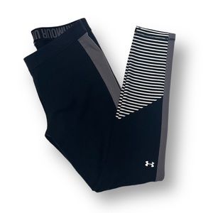 Under Armour black and gray leggings with black and white stripes. Size L.